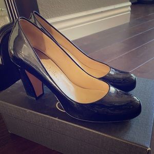 Cole Haan black patent pumps